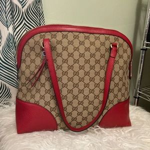 Authentic Gucci purse with red trim